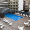 Photo travel inn hotel piscine b