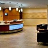 Photo springhill suites by marriott syracuse carrier circle lobby reception b